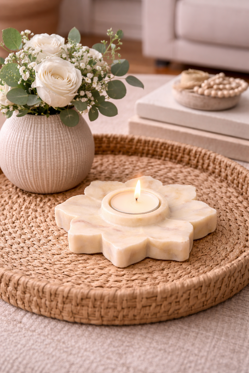 Marble flower shaped candle holder creating warm ambient glow