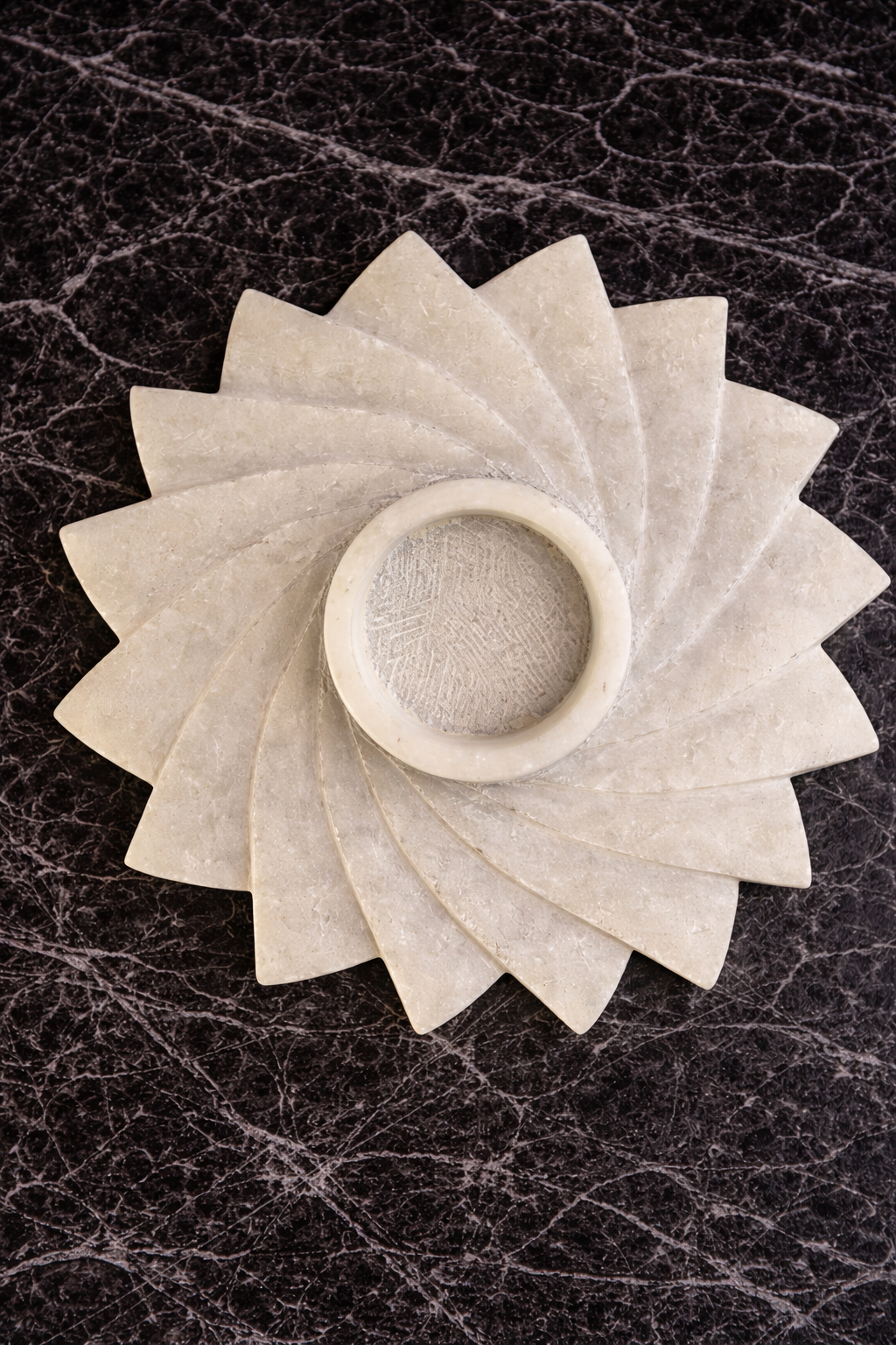 Handcrafted marble spiral tealight holder with floral carved detailing