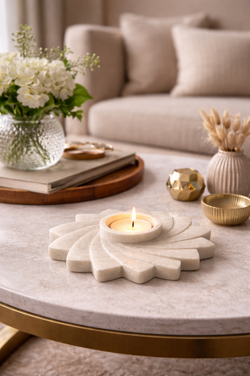 Handcrafted marble spiral tealight holder creating warm ambient glow
