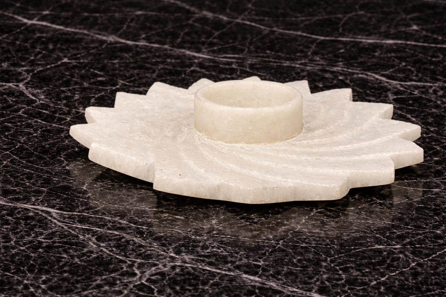 Marble spiral tealight stand with floral carved design