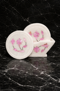 Luxury marble coaster set with pink floral stone inlay on black marble background – handcrafted marble coasters NZ