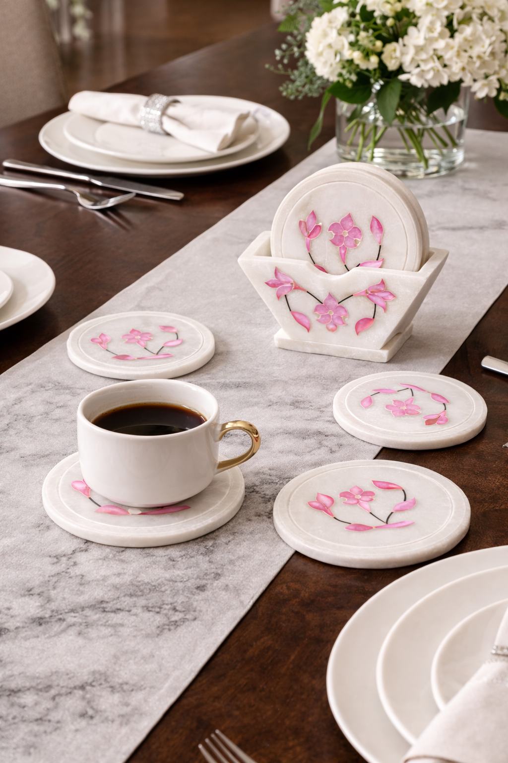 Handcrafted marble coaster set on modern dining table with coffee cup – decorative stone coasters for drinks