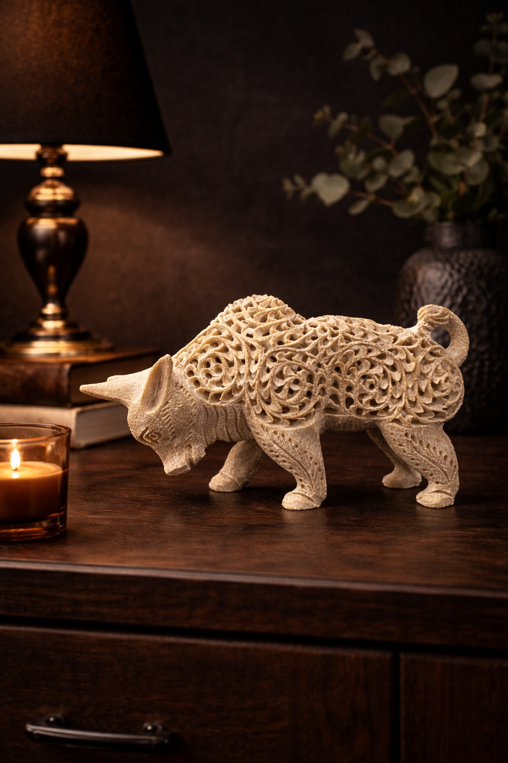 Handcrafted soapstone bull sculpture with tealight holder centerpiece on living room