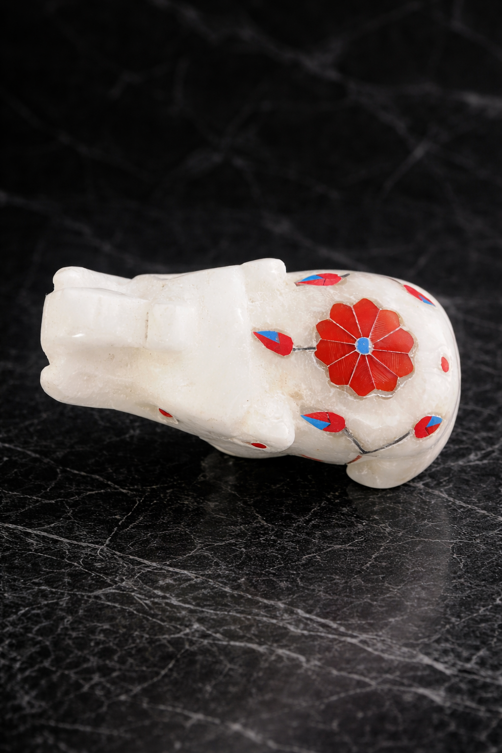 Top view of marble elephant inlay stonework floral detail handcrafted NZ