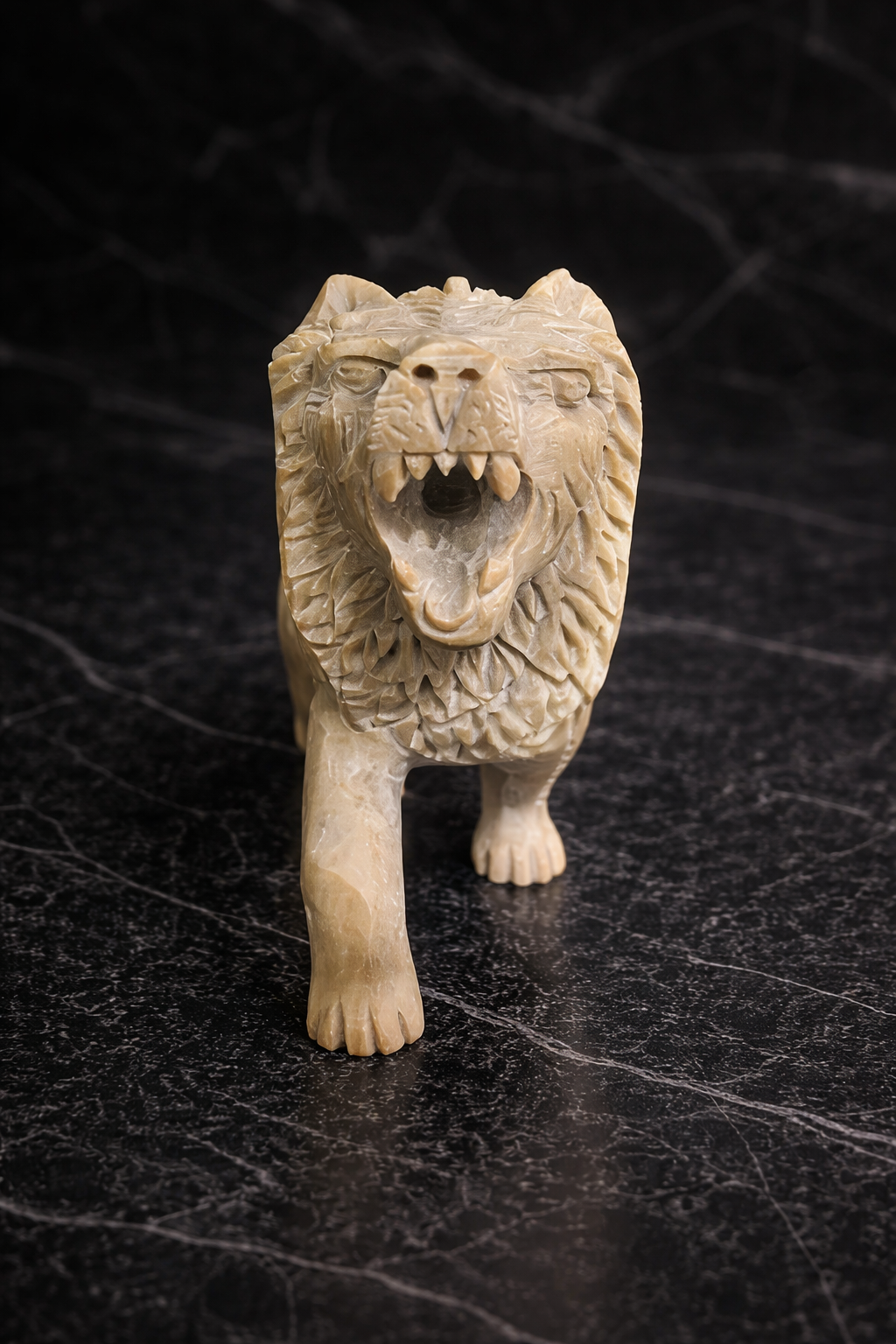soapstone lion statue on black marble background luxury stone decor modern home styling nz