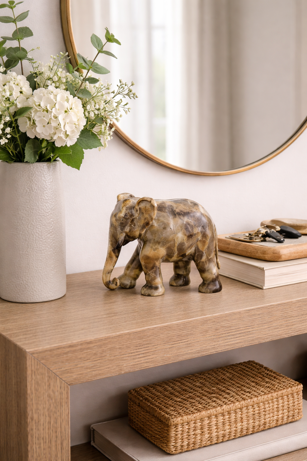 luxury entrance decor soapstone elephant with floral arrangement nz