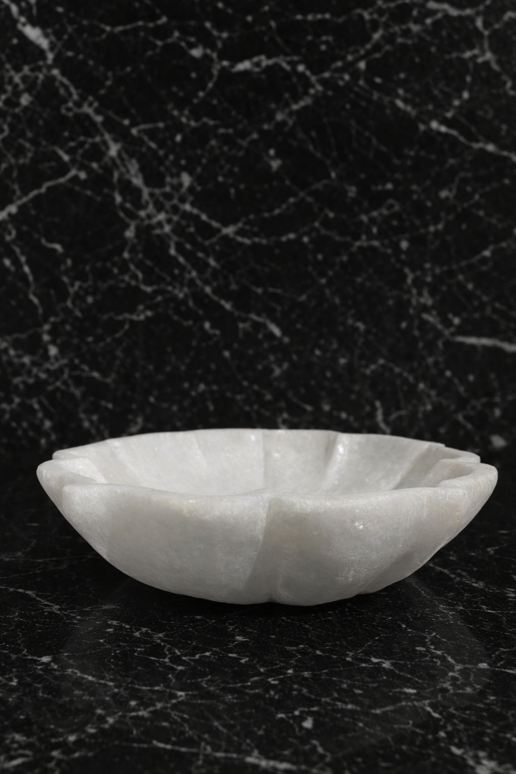 white marble decorative bowl nz on black marble background