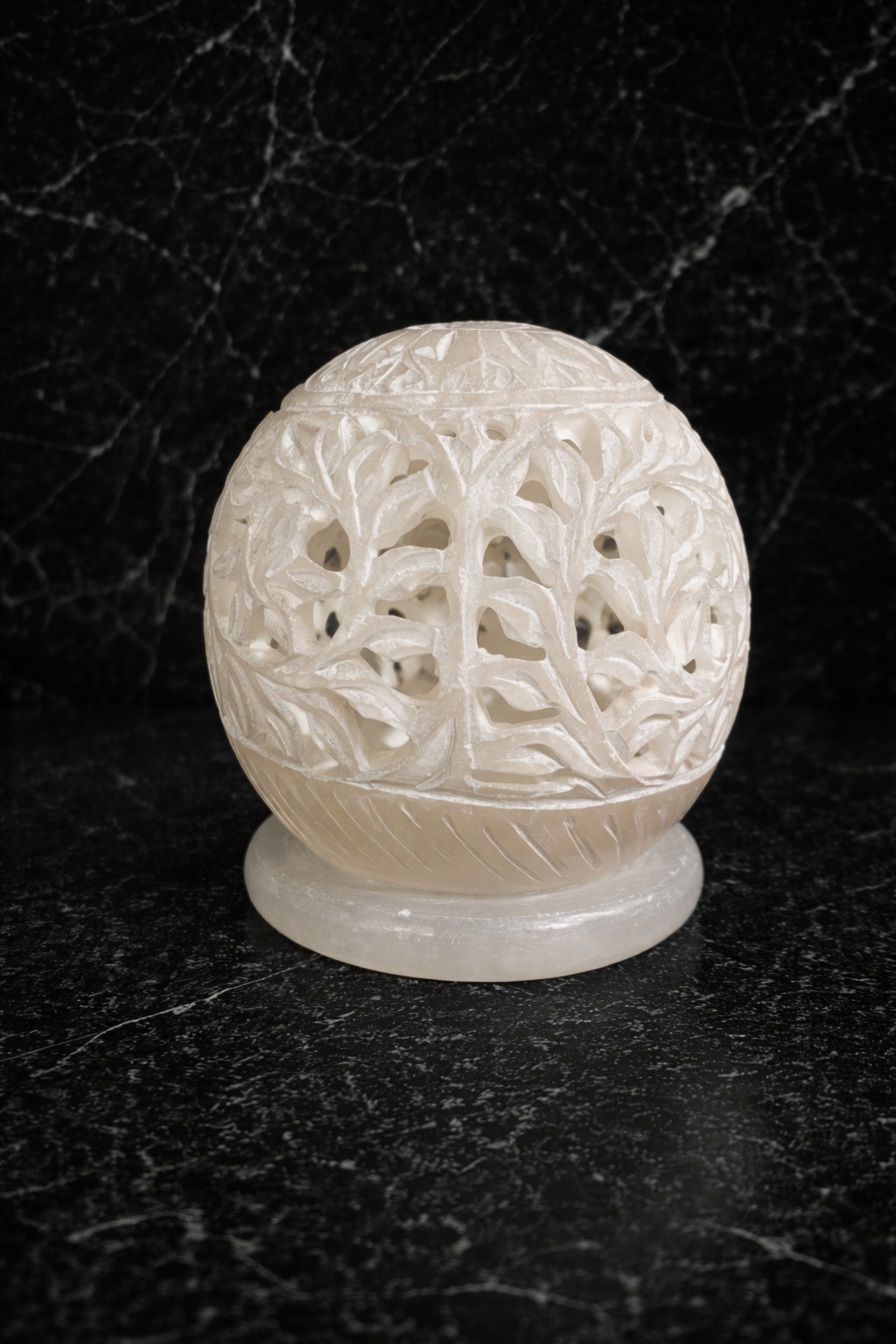 white marble tealight candle holder floral design on black marble background nz luxury home decor