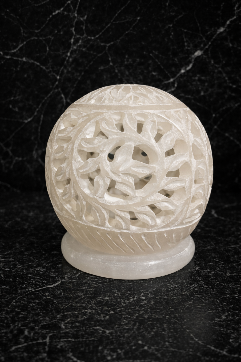 white marble tealight candle holder floral design on black marble background nz luxury home decor