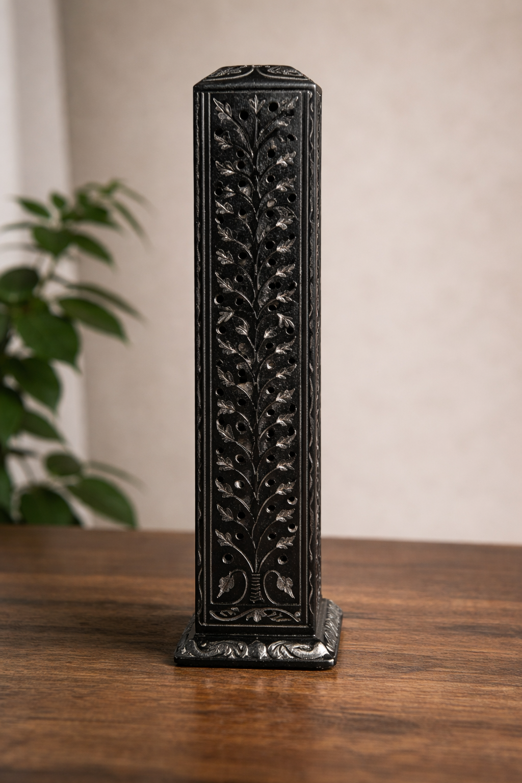 black stone tealight holder on wooden table warm ambient home decor NZ