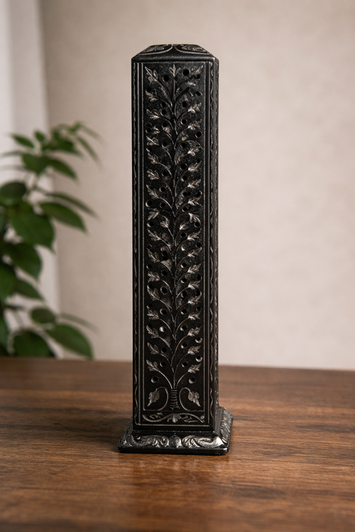 black stone tealight holder on wooden table warm ambient home decor NZ