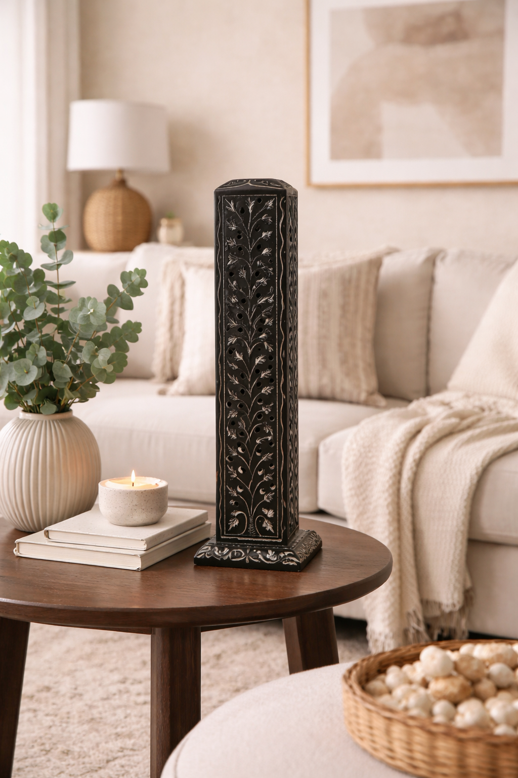 black stone decorative candle holder on wooden coffee table modern living room decor NZ