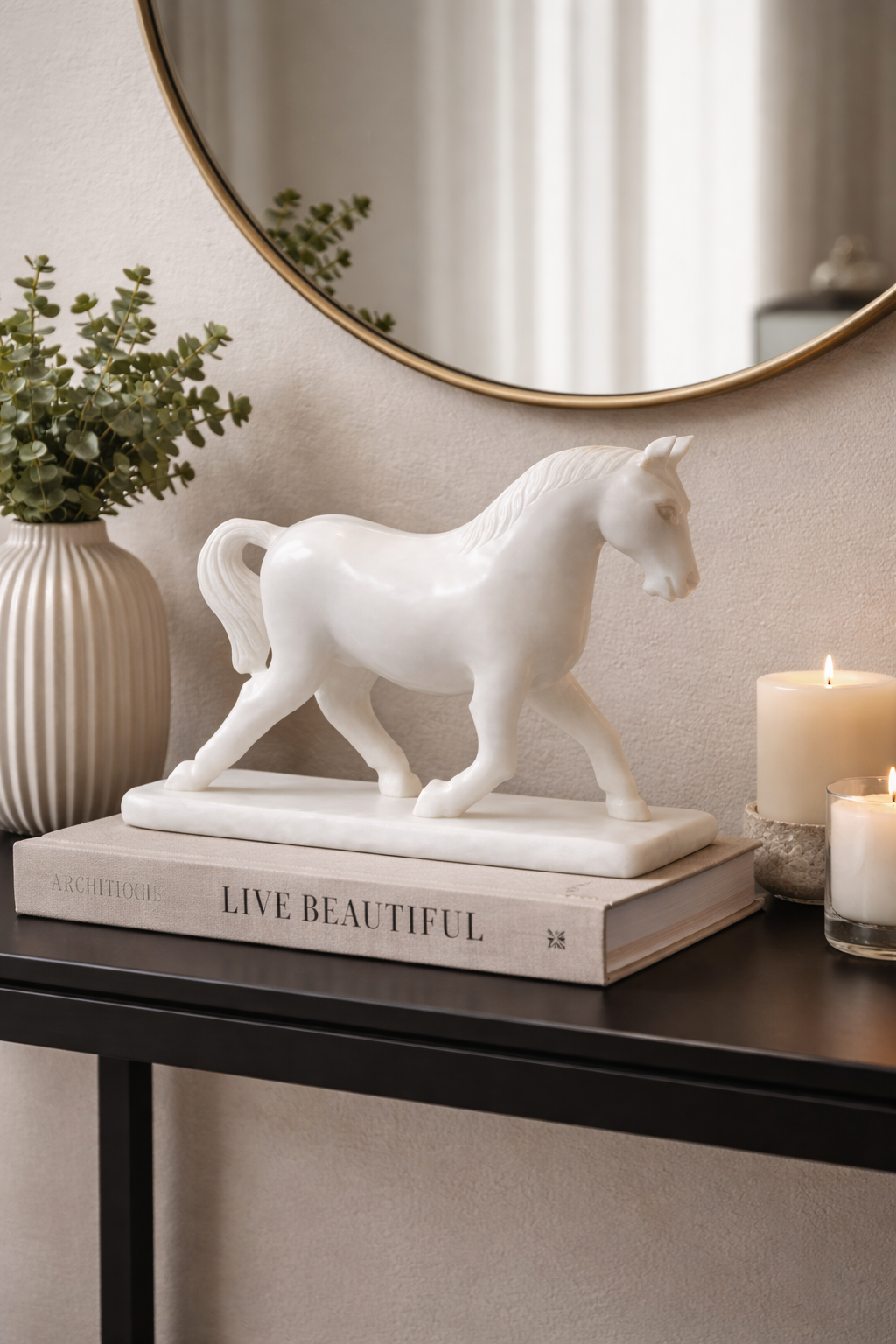luxury marble horse sculptures styled on console table with candles and mirror modern nz decor