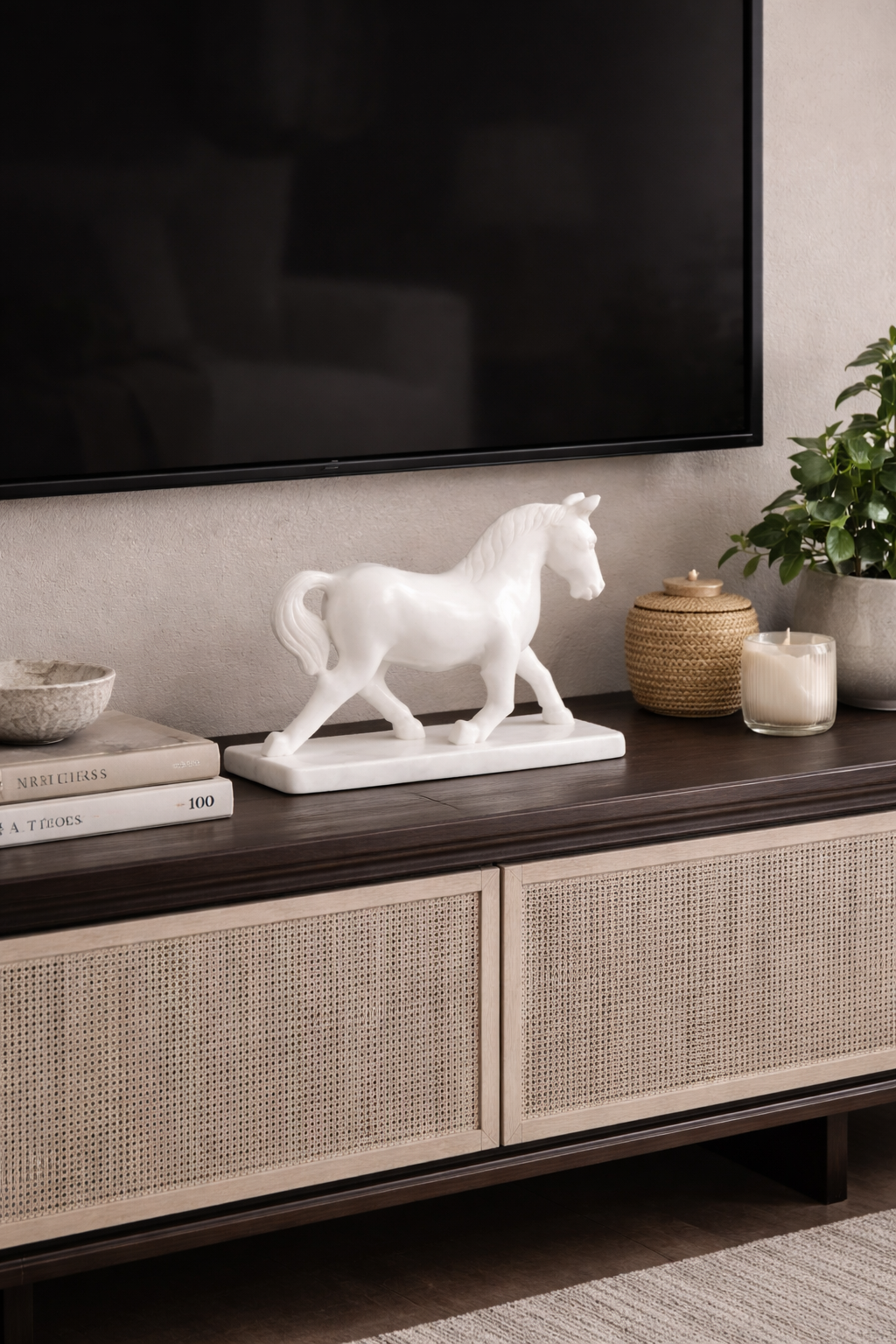 white marble horse sculpture on media console with indoor plant premium decor nz