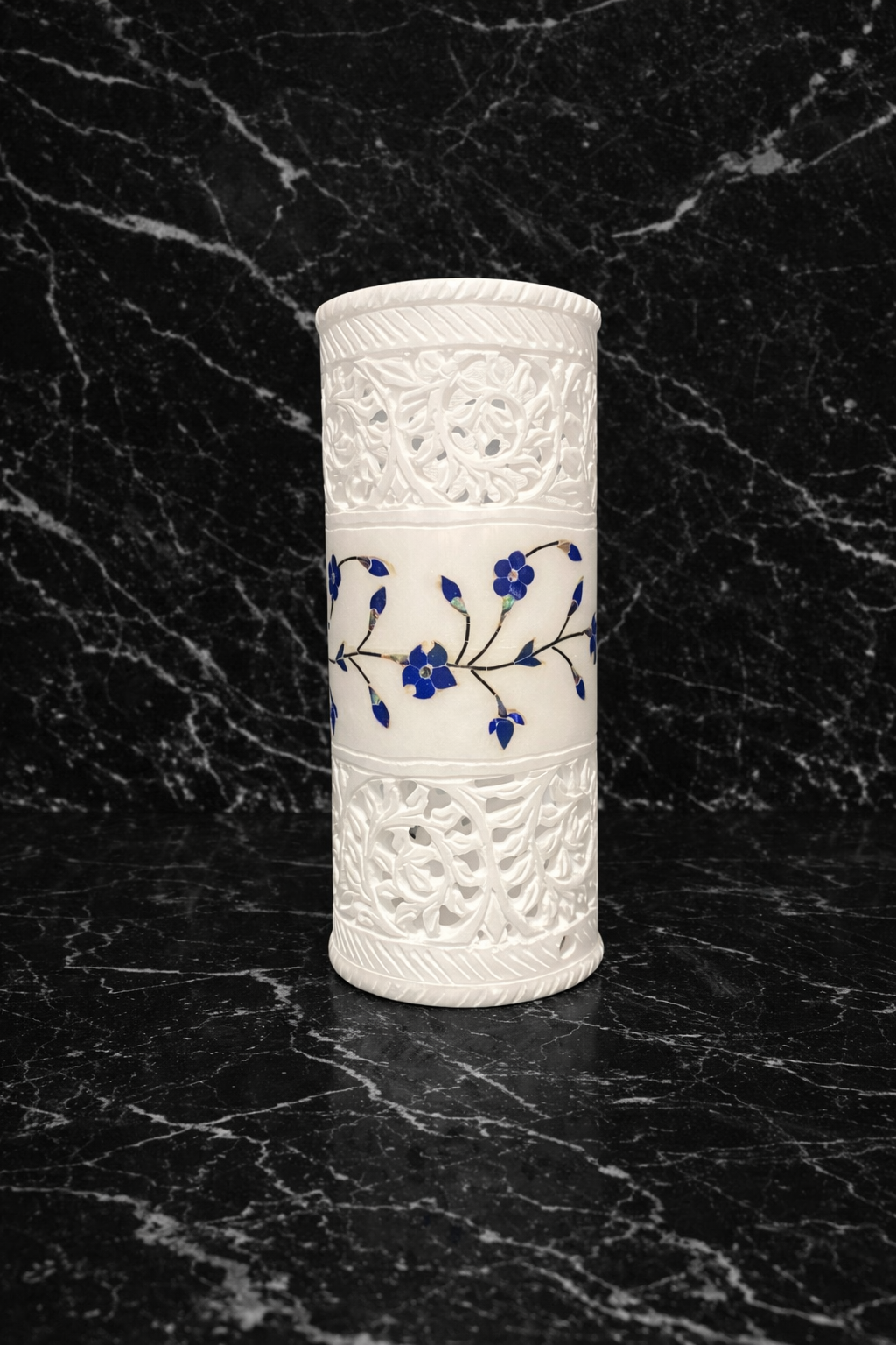 0.549 kg decorative white marble flower vase with blue floral design and carved detailing on black marble surface