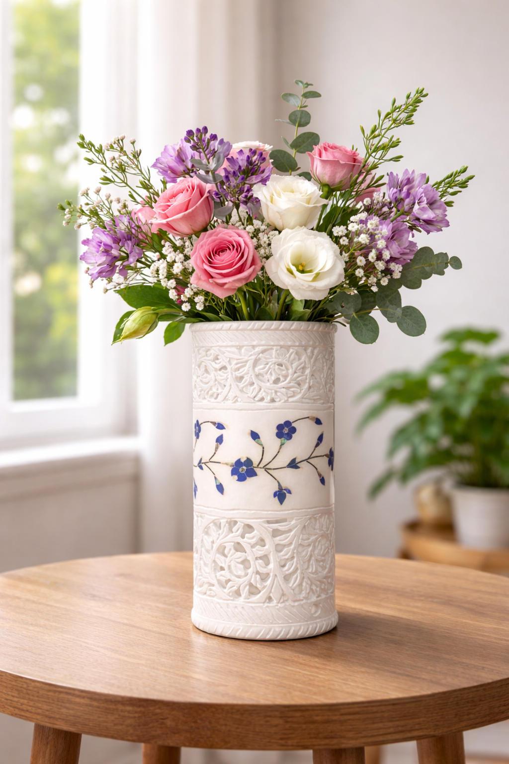 Luxury hand-carved marble vase with blue floral inlay filled with fresh flowers, elegant home décor accent nz