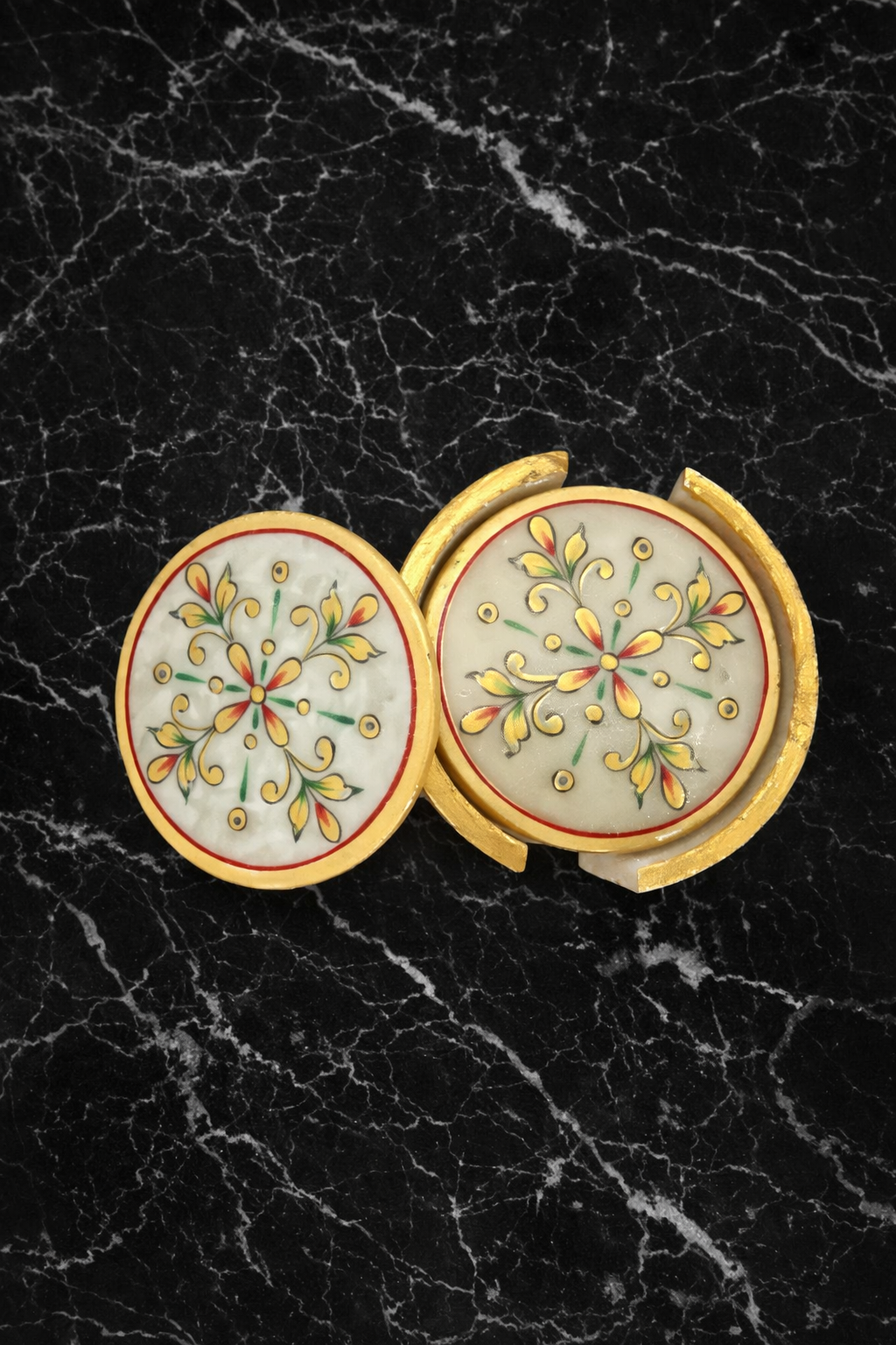0.799kg Premium white marble coaster with hand painted floral design displayed in gold holder.