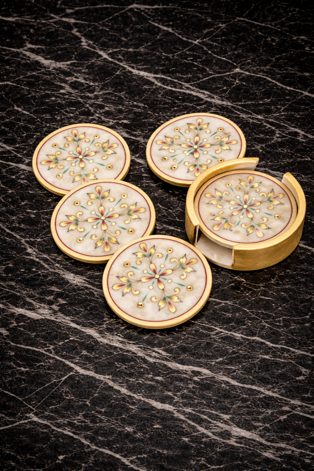 Decorative marble coaster set with holder featuring hand painted floral design on black marble surface.