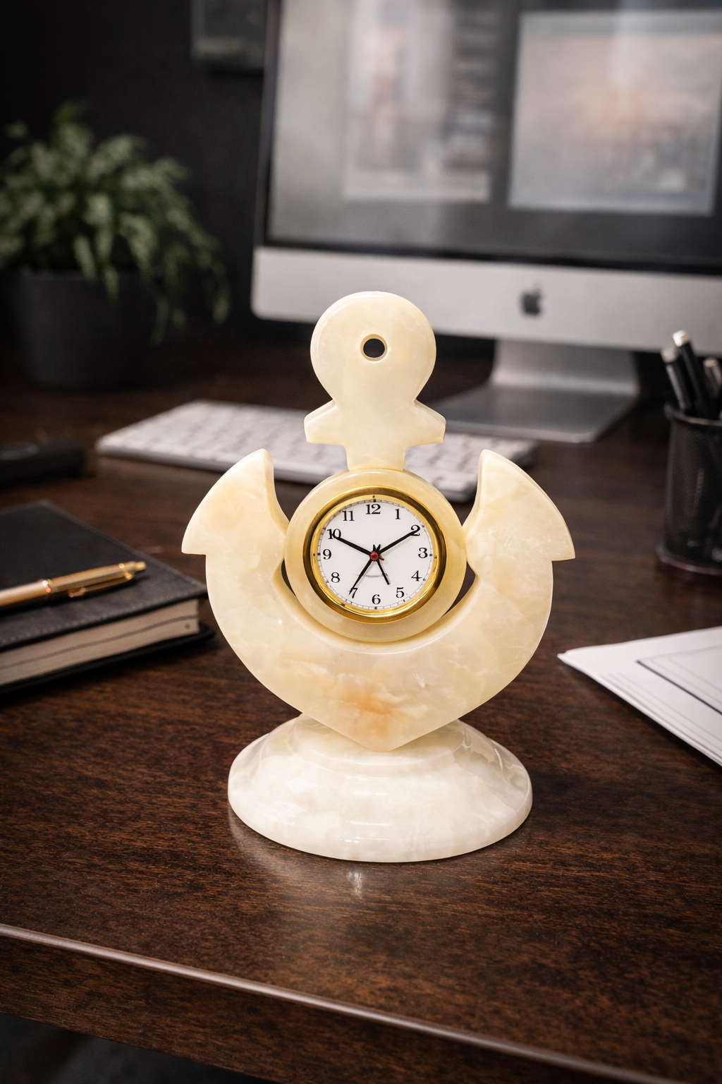 Hand-carved onyx anchor desk clock displayed as decorative office desk décor in a modern workspace.