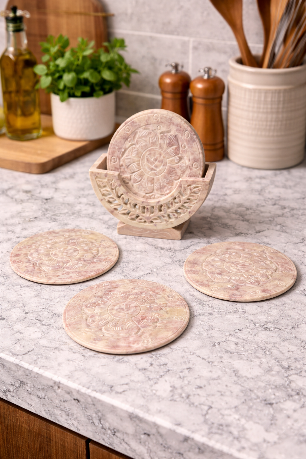 Hand carved soapstone lotus design coaster set with holder on marble kitchen counter