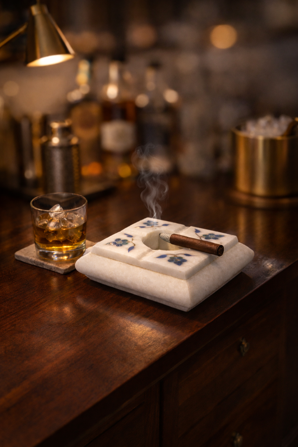 Luxury white marble cigar ashtray with blue floral inlay on wooden home bar