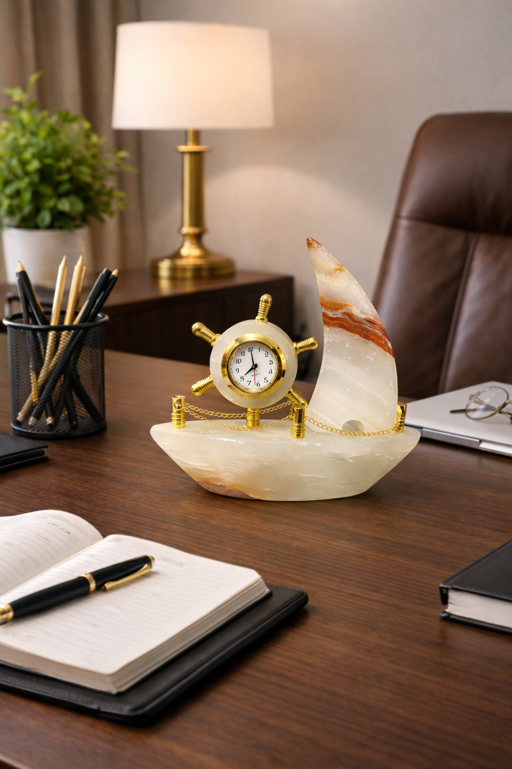 Luxury onyx sailboat clock placed on office desk, nautical stone decor accessory for executive workspace nz