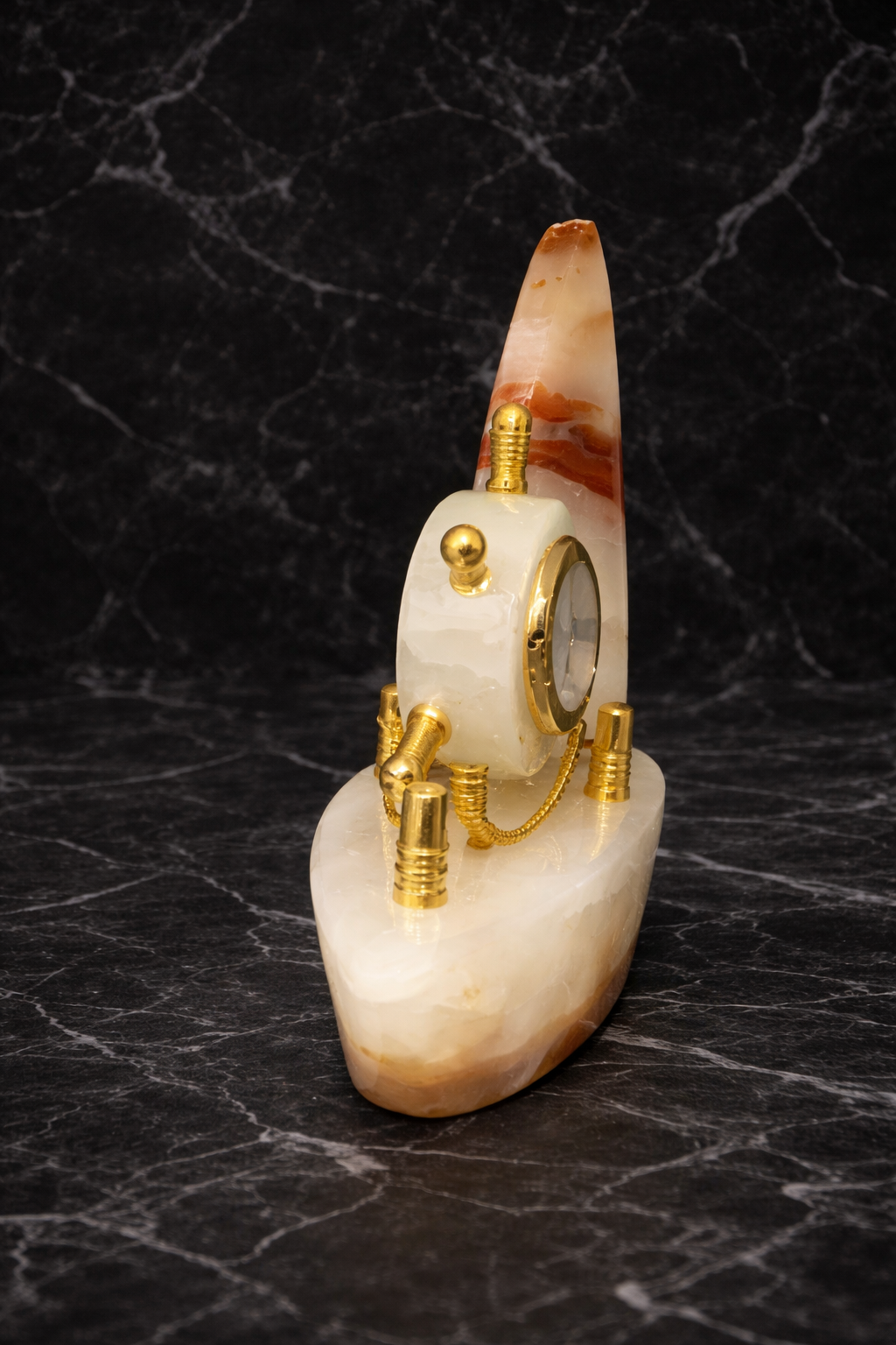 Elegant natural onyx boat clock with gold chain detailing, nautical luxury home decor accent