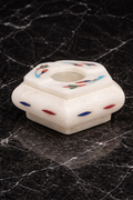 Premium marble cigar ashtray with multistone inlay on black marble surface luxury cigar lounge decor marble home bar accessories