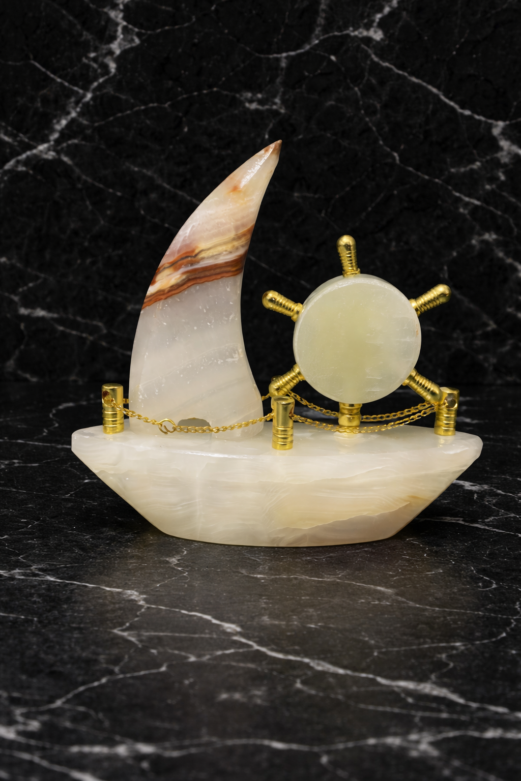 Luxury onyx sailboat clock sculpture on black marble background – nautical marble desk décor piece for modern home interiors nz