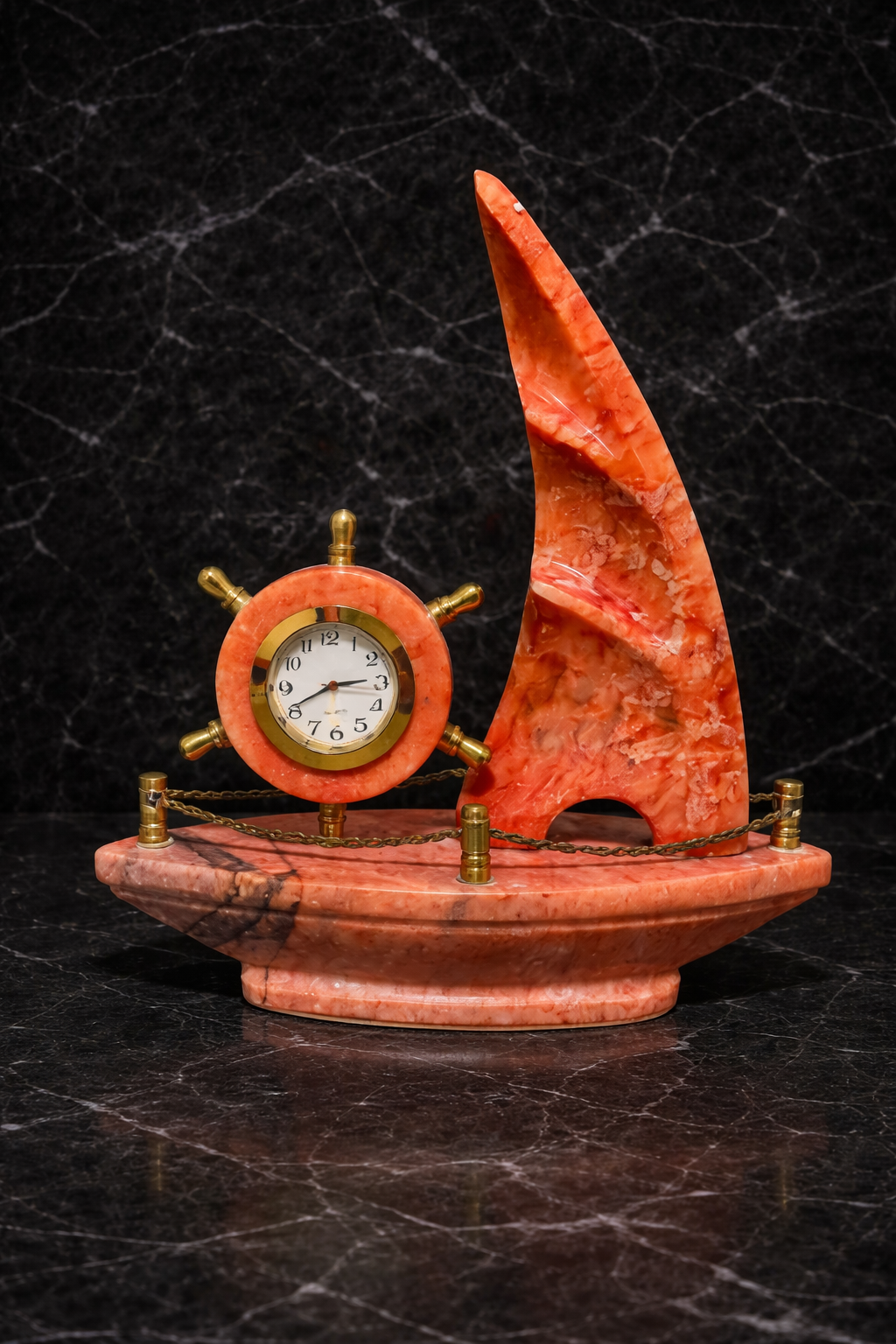 Luxury red onyx sailboat marble clock on black marble background – elegant nautical desk décor for modern homes nz