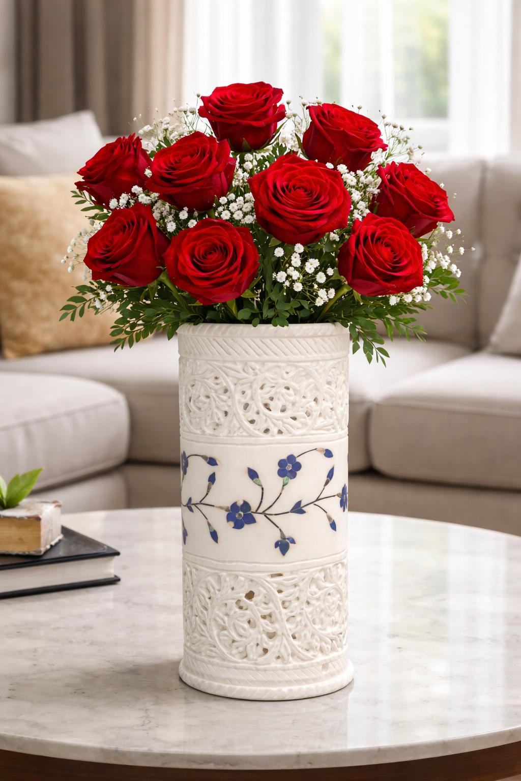 Statement marble flower vase with red roses floral arrangement on living room table luxury home décor NZ