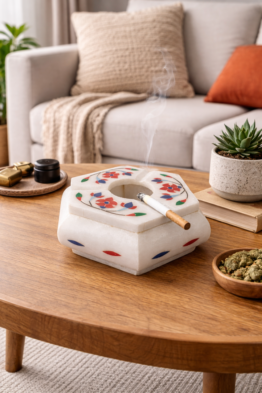 Luxury marble ashtray with floral stone inlay placed on living room coffee table – elegant smoking accessory