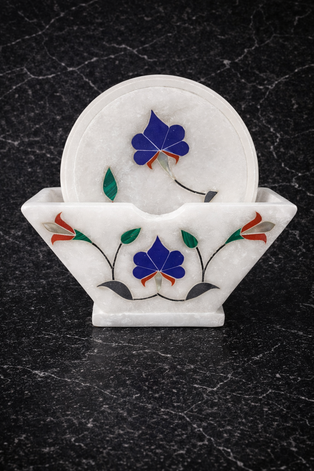 Luxury marble coaster set with multicolour stone inlay and marble holder on black marble background – premium marble coasters NZ