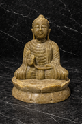Hand-carved polished soapstone Buddha statue seated on lotus base, natural stone figurine for meditation and spiritual home décor in NZ.