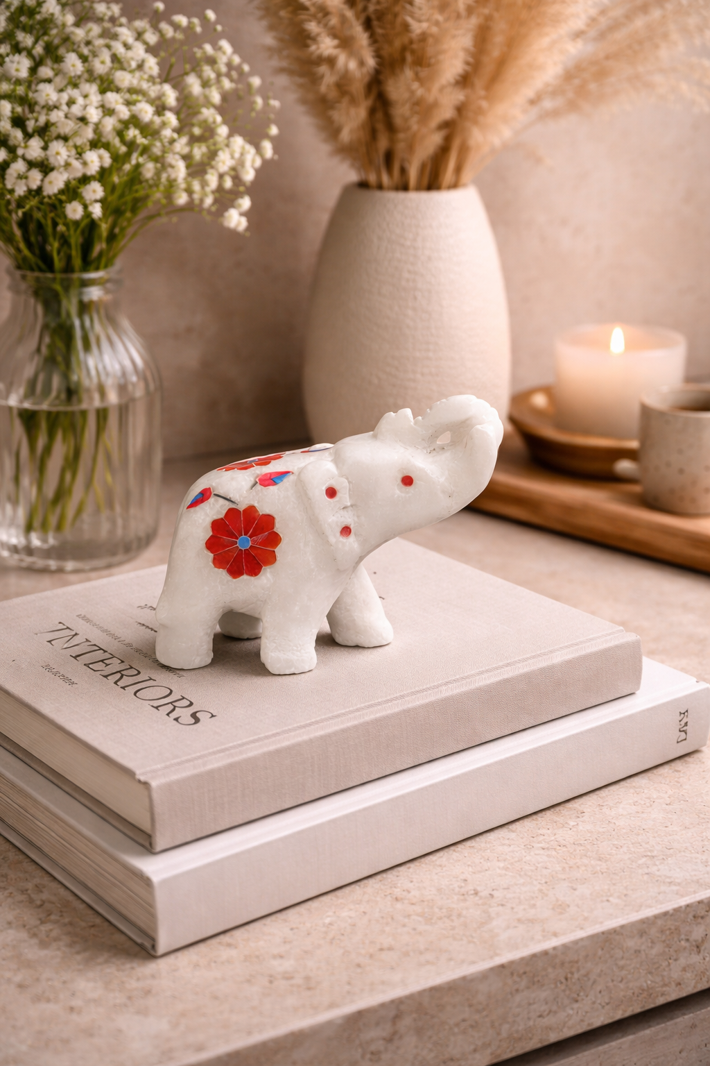 luxury marble elephant decor with warm lighting entryway setup NZ