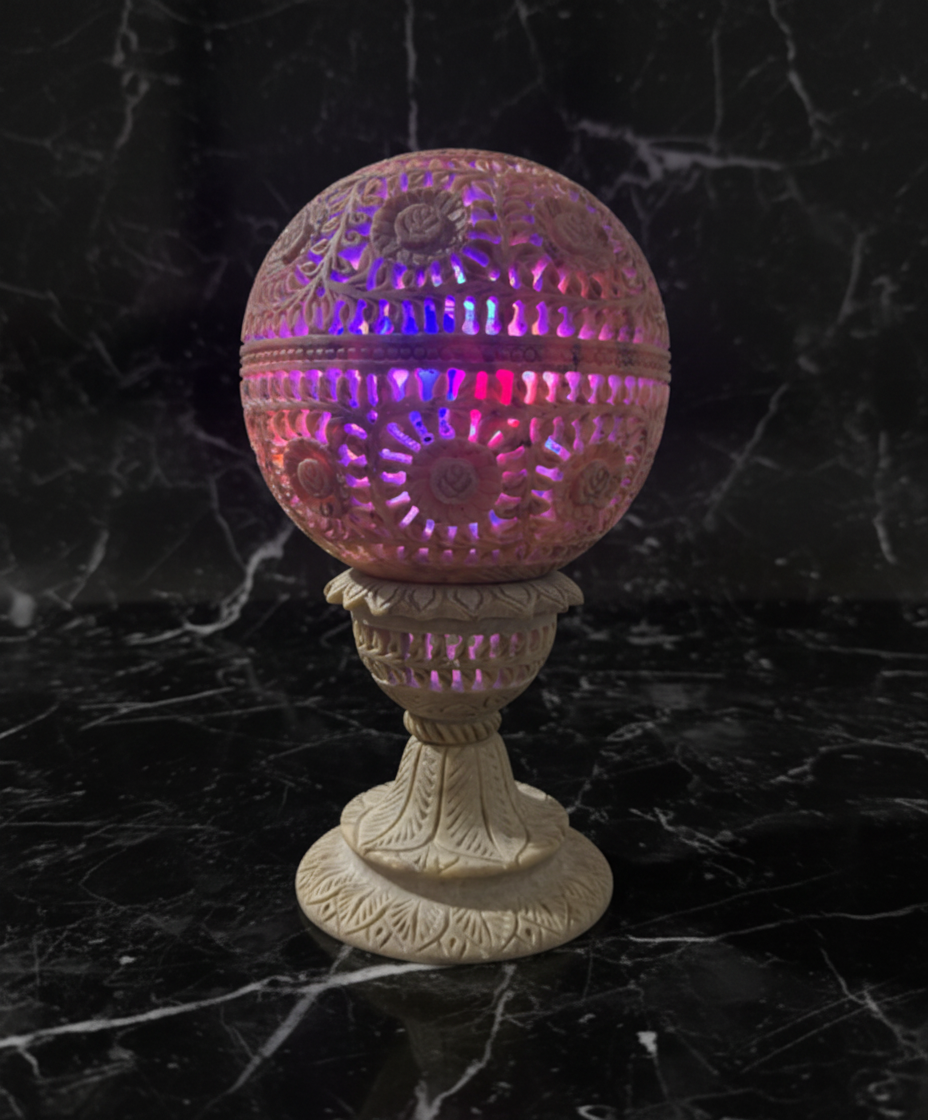 Natural soapstone round tealight holder creating soft ambient light